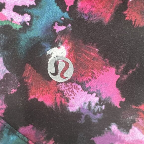 Lululemon Speed Short 8 Mini Midnight Bloom Black Deep Fuschia woman running - Picture 6 of 7